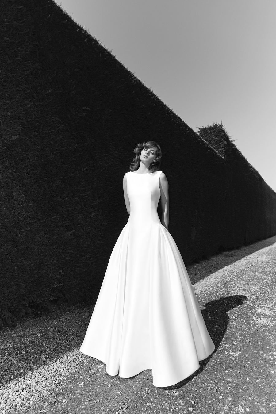 Viktor & Rolf Mariage Bridalwear Collection, Mikado clean cut gown, minimalist white A-line design, classic elegance.