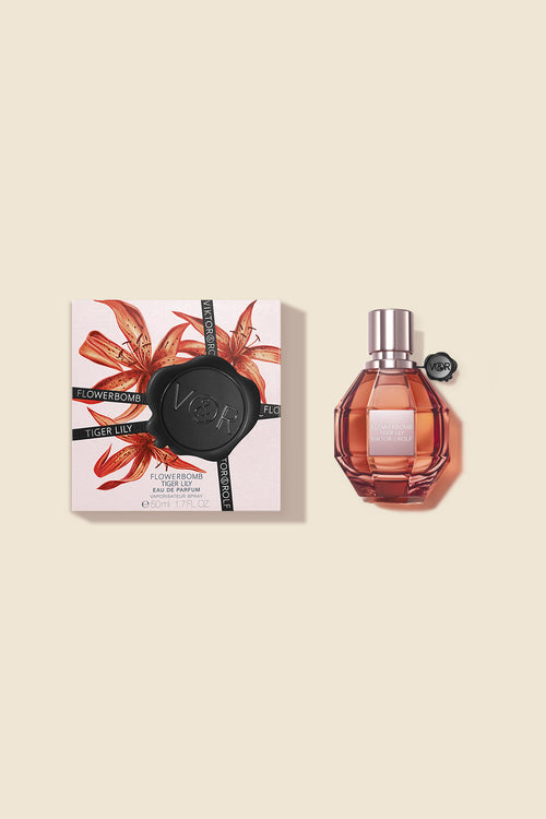 Flowerbomb Tiger Lily Eau de Parfum for women by Viktor & Rolf, with sleek pink bottle and floral packaging design.