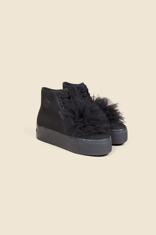 Stylish black high-top sneakers featuring intricate tulle accents on the upper, paired with a sturdy rubber sole for comfort.