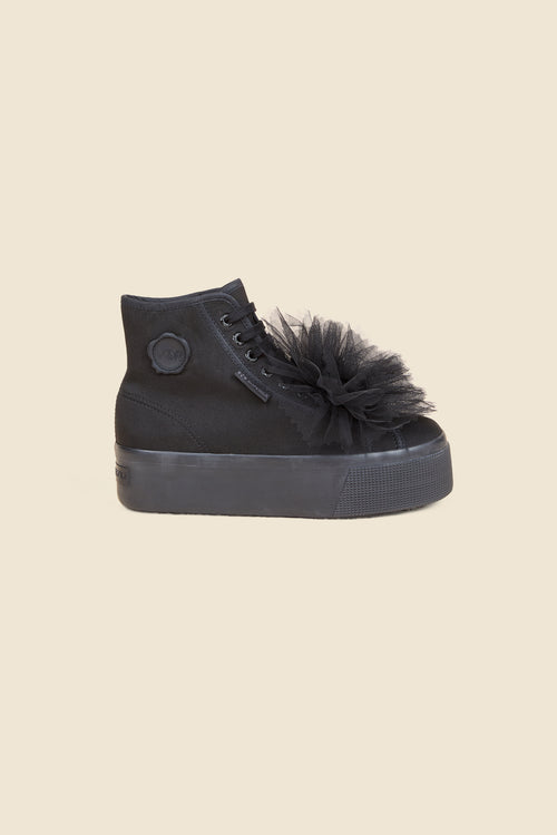 Black high-top sneaker with tulle rosette embellishment and platform sole, featuring tonal lace-up and logo detail.