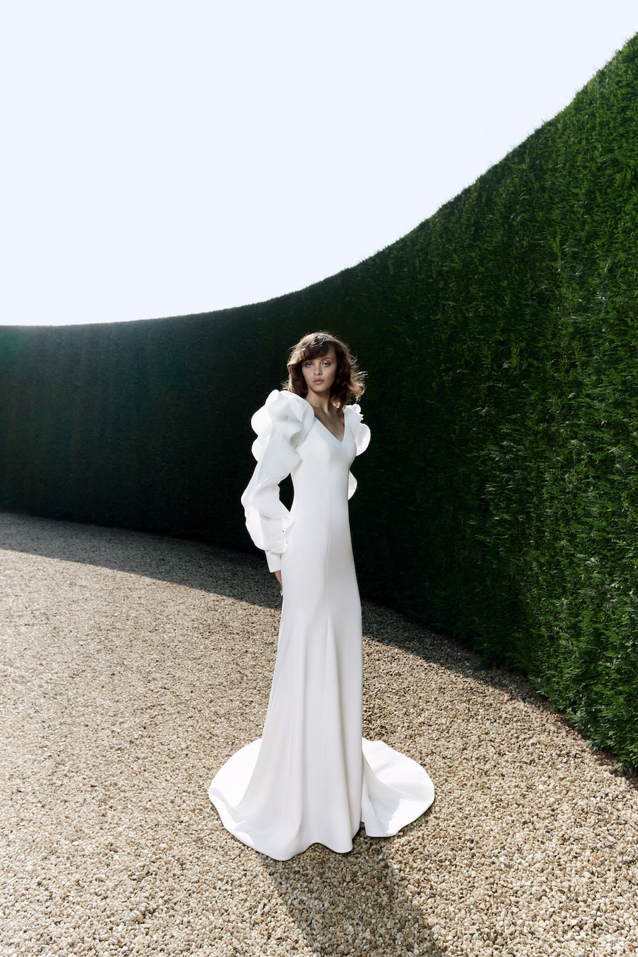 Viktor & Rolf Mariage Bridalwear Collection Organza Cloud Mermaid gown, elegant with sculptural sleeve design.