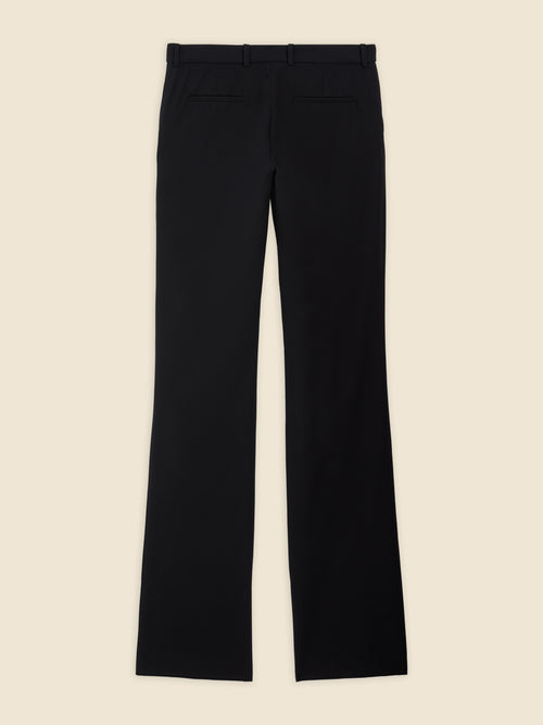 Black tailored trousers with a straight-leg design, featuring belt loops and back welt pockets, crafted from smooth fabric.