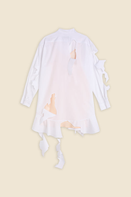 Contemporary white shirt featuring artful shredded cutouts with an asymmetrical hem, creating a unique fashion statement.