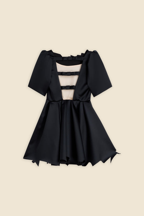 Short black satin dress with structured puff sleeves, cut-out back featuring elegant bow detailing, and an A-line silhouette.