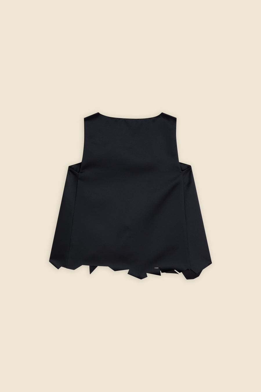 Black sleeveless top featuring an asymmetrical hemline with pointed cutouts, crafted from smooth, lightweight fabric.