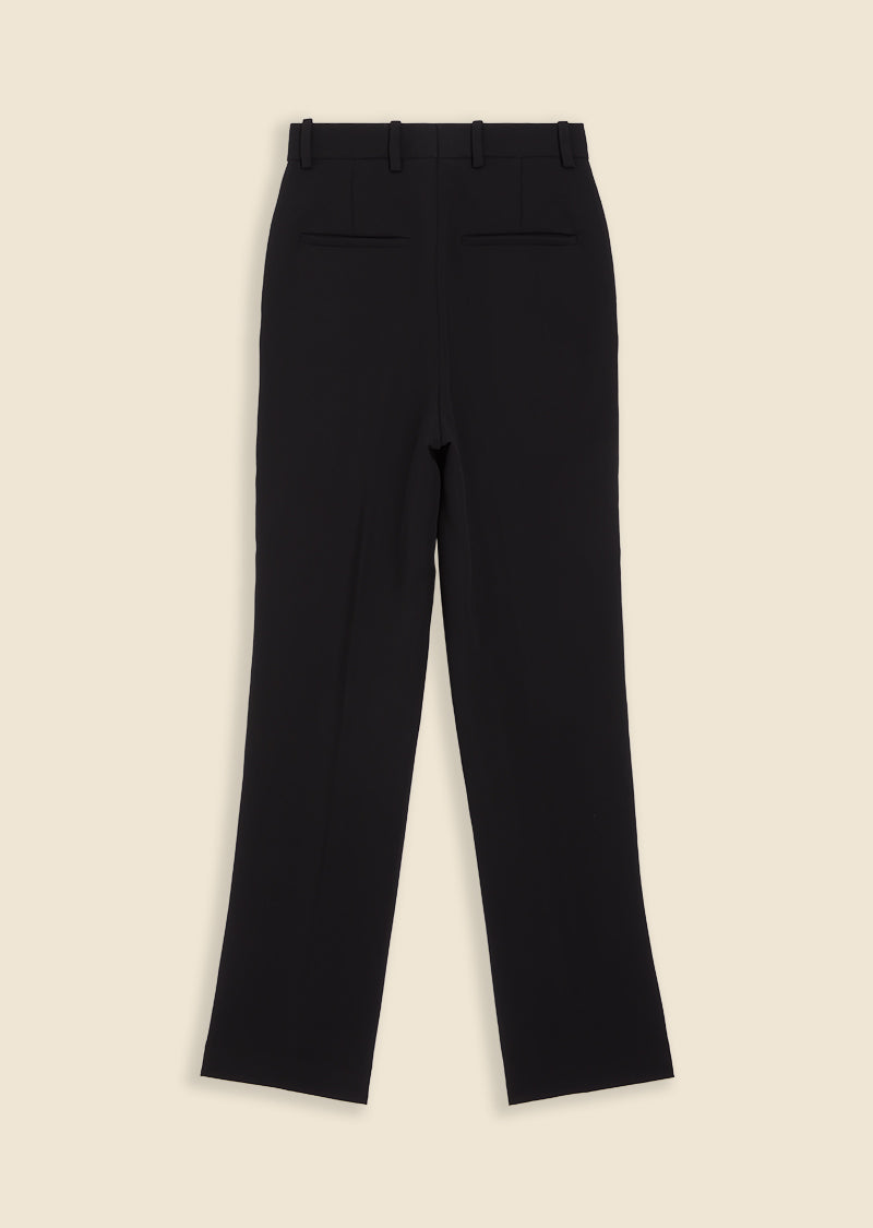 Tailored black trousers with straight legs and discreet welt pockets, crafted from smooth wool blend fabric.