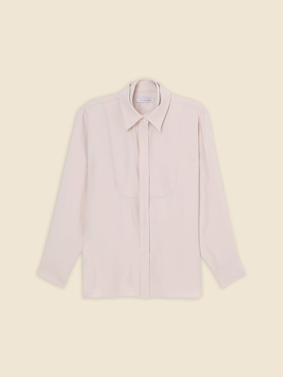 Elegant cream long-sleeve blouse with pointed collar and button-up front, perfect for a classic and sophisticated look.