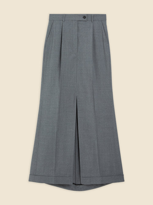 Gray wool-blend pleated maxi skirt with high waist, featuring tailored front slits and a classic button closure.