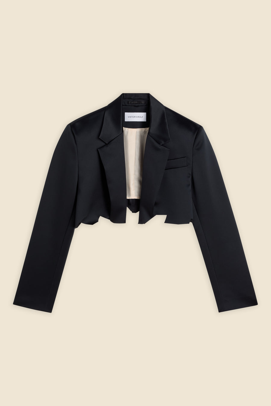 Cropped black satin jacket with structured shoulders and notched lapels, featuring a minimalist elegant design.